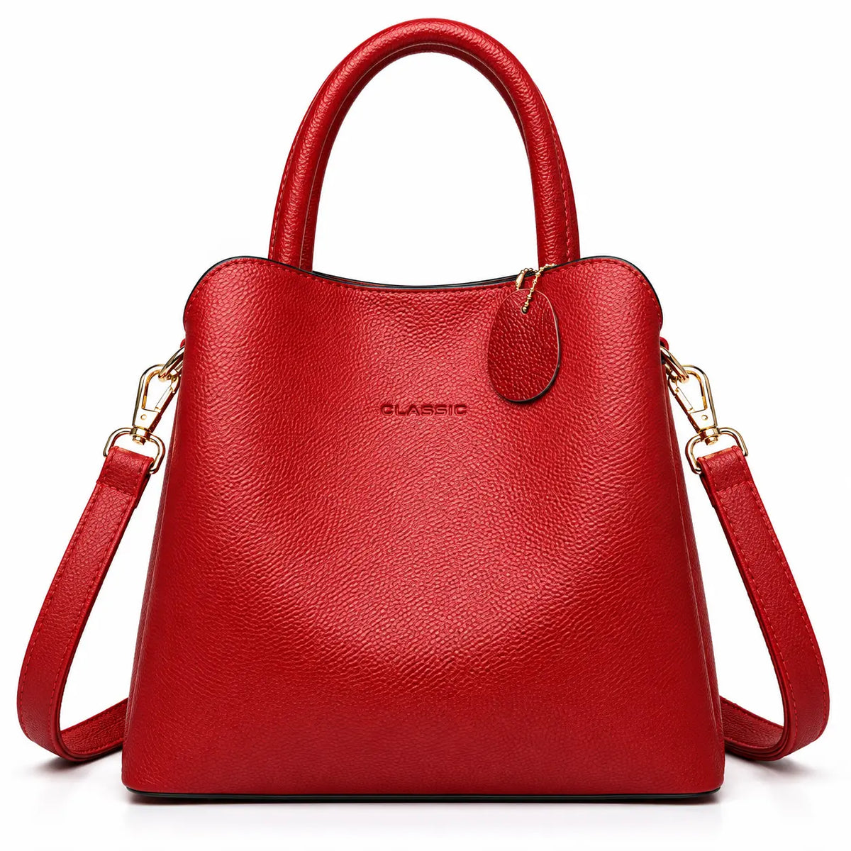 A bright red pebbled leather handbag with top handles and a detachable shoulder strap, shown on a clean white background. The brand name 'CLASSIC' is subtly embossed on the front.