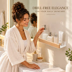 30cm wall mounted bathroom cosmetic organizer with natural beech wood rail and white aluminum shelf holding skincare bottles in a modern bathroom